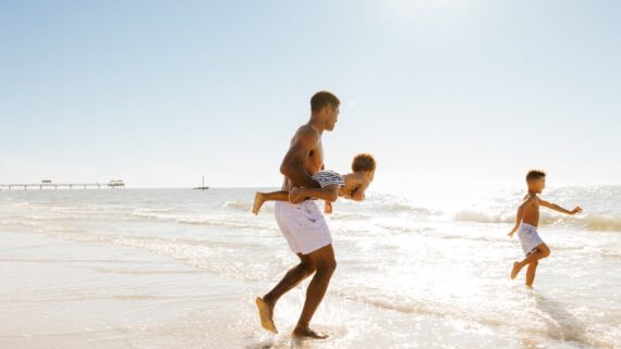 Father on Clearwater Beach with sons