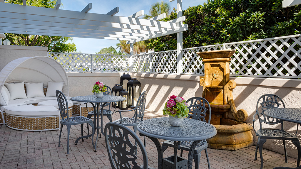 The shaded courtyard at The Capri Inn.