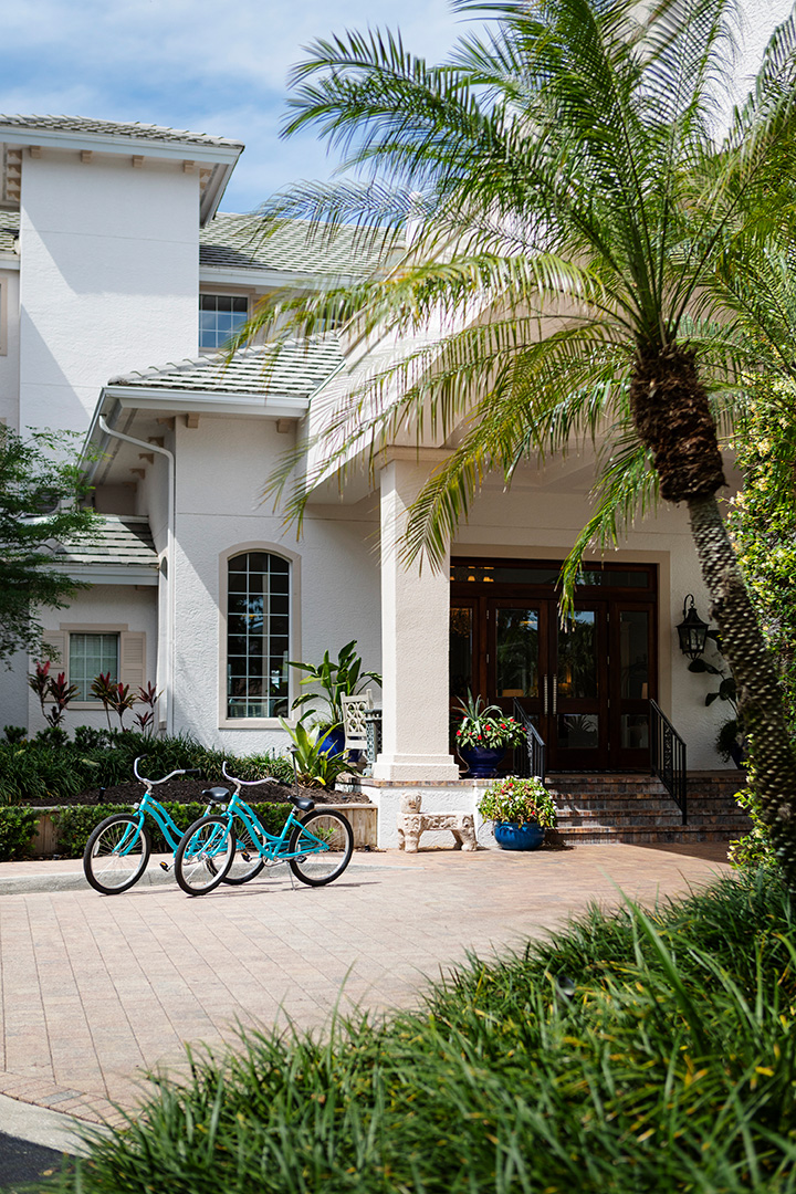 The baby blue cruiser bikes come with your stay.