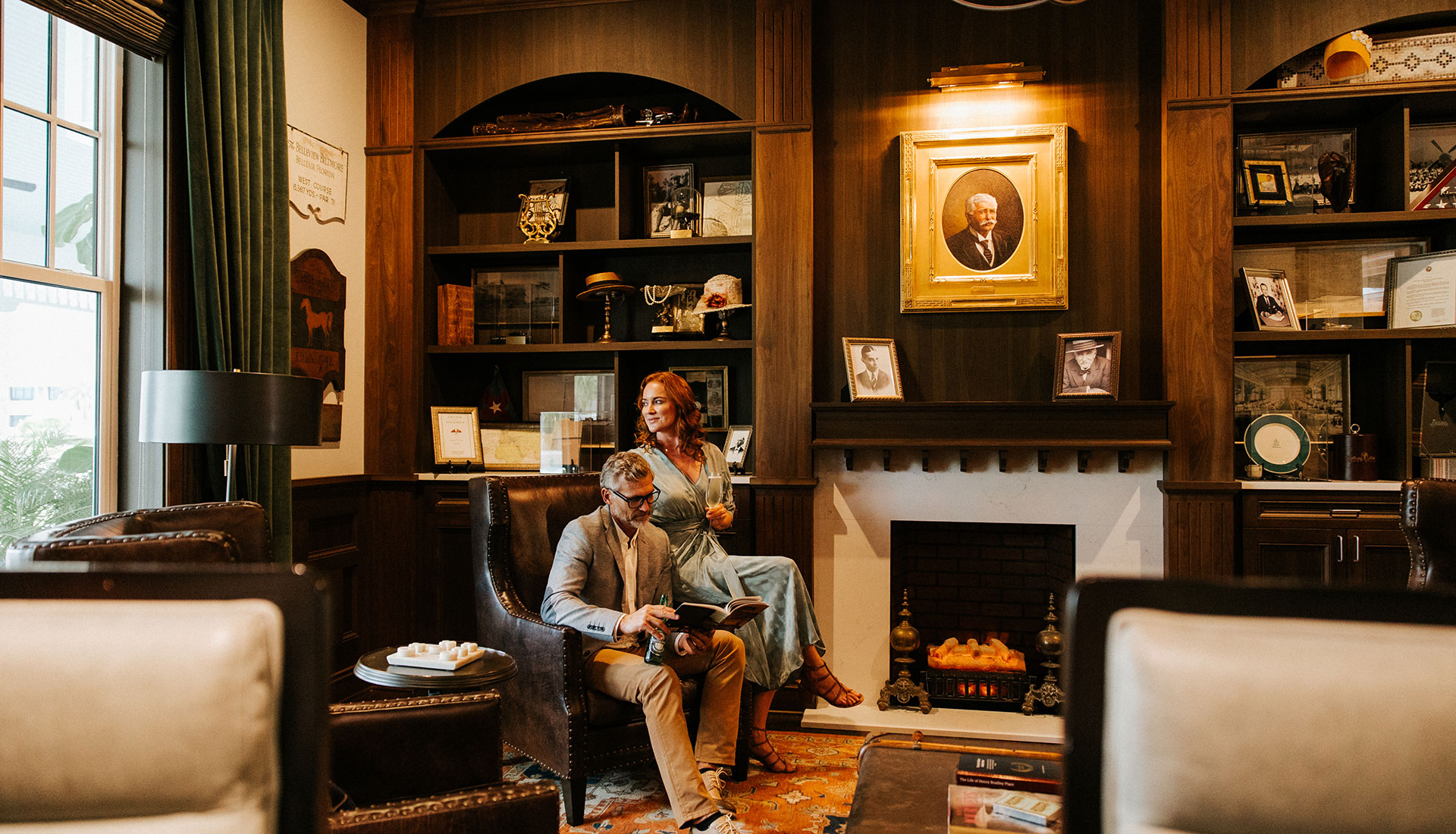 A couple sits in the Morton Reading Room.
