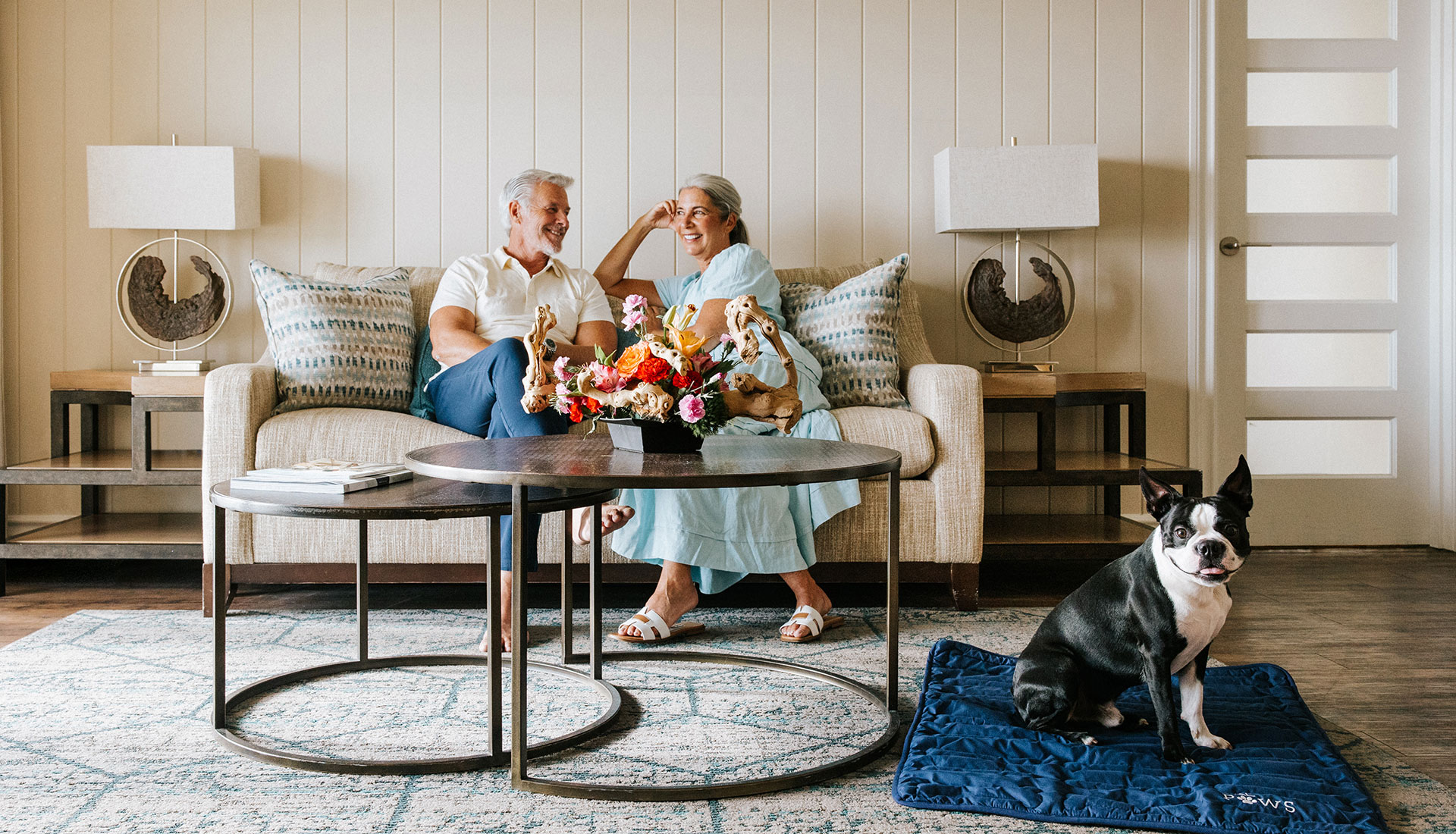 A couple relaxes in a suite at Edgewater Beach Hotel.