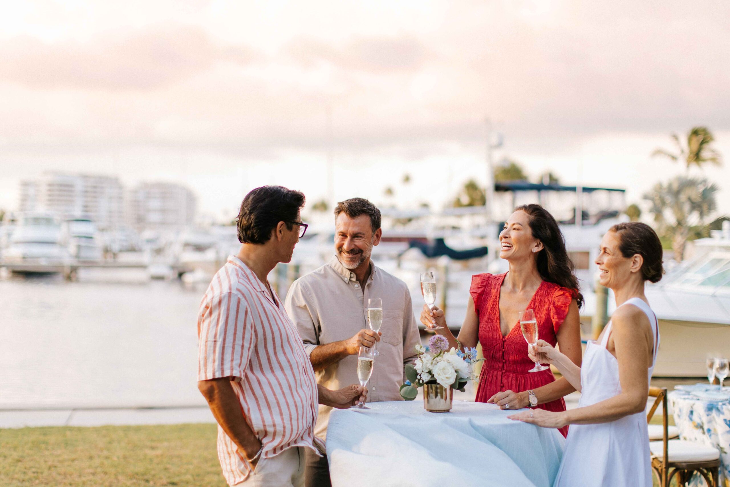 Colleagues toast champagne during a meeting event function.