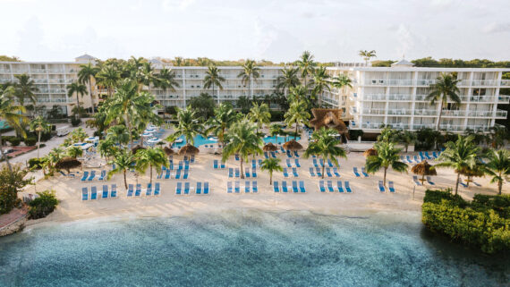 An aerial view of the beach and pool at Reefhouse Resort & Marina in Key Largo, Florida.