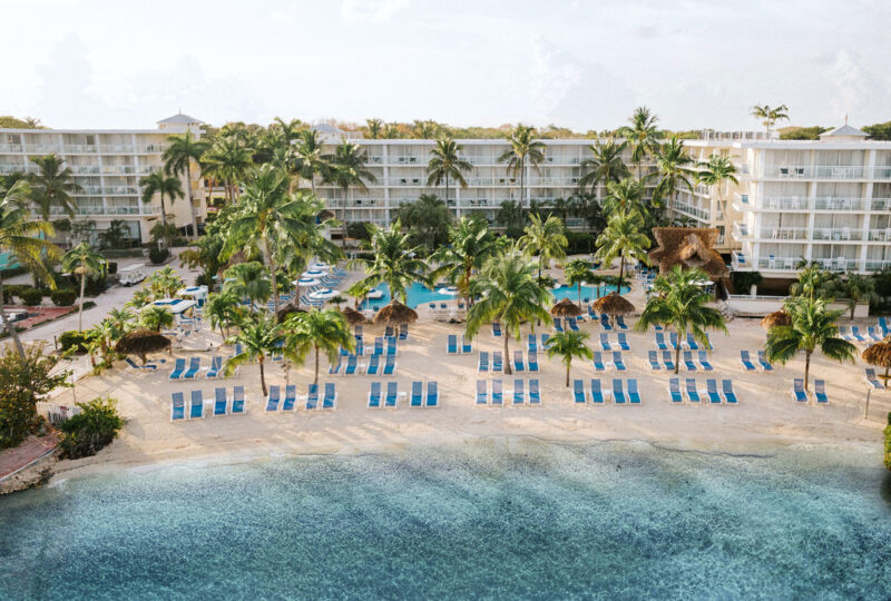 An aerial view of the beach and pool at Reefhouse Resort & Marina in Key Largo, Florida.