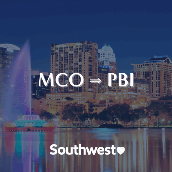 Nighttime cityscape with tall buildings and a colorful fountain, text reads MCO → PBI above the Southwest Airlines logo.