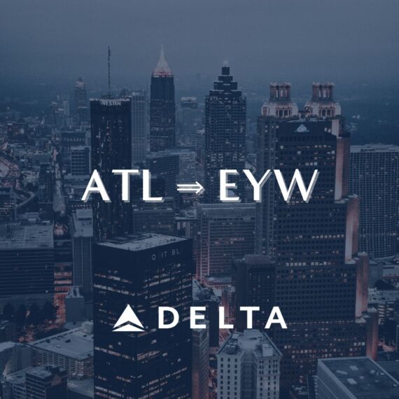 A city skyline at dusk with the text ATL ➔ EYW and the Delta Air Lines logo below, indicating a flight route from Atlanta to Key West.