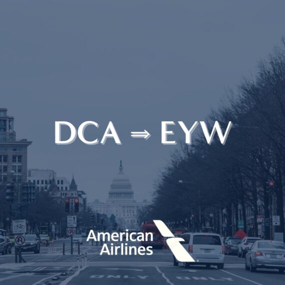 A city street in Washington, D.C. with the U.S. Capitol in the background. Text reads DCA ⇒ EYW above the American Airlines logo.