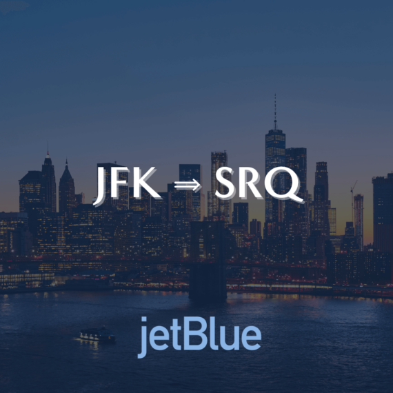 Skyline of a city at dusk with illuminated skyscrapers, reflecting in the water. The text JFK ➔ SRQ is above, indicating a route, and jetBlue is below, suggesting the airline.
