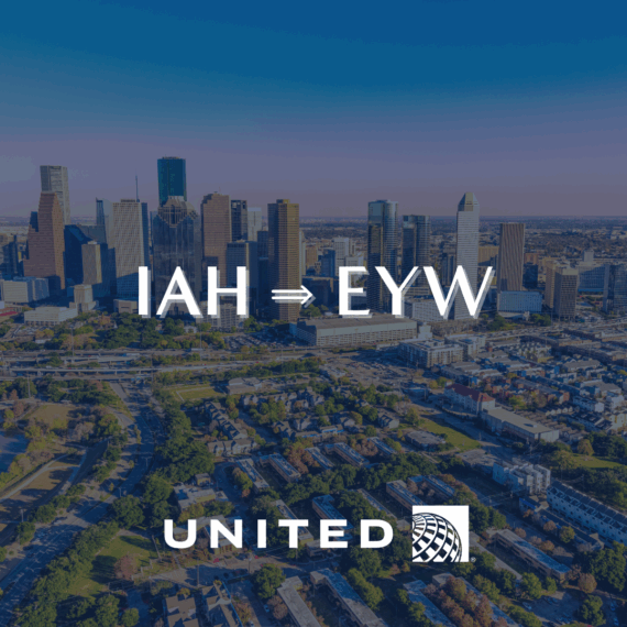 Aerial view of a city skyline with IAH ⇒ EYW in bold white letters and the United Airlines logo at the bottom.