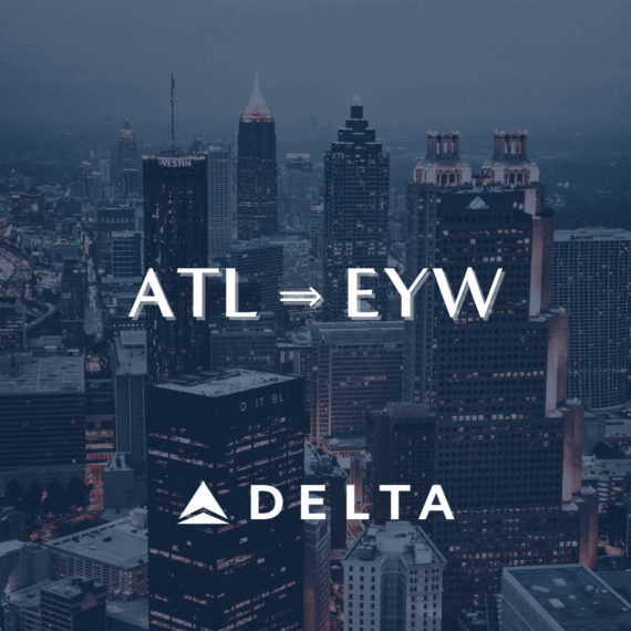Aerial view of a city skyline at dusk with text “ATL ⇒ EYW” and the Delta Air Lines logo, promoting a flight from Atlanta to Key West.