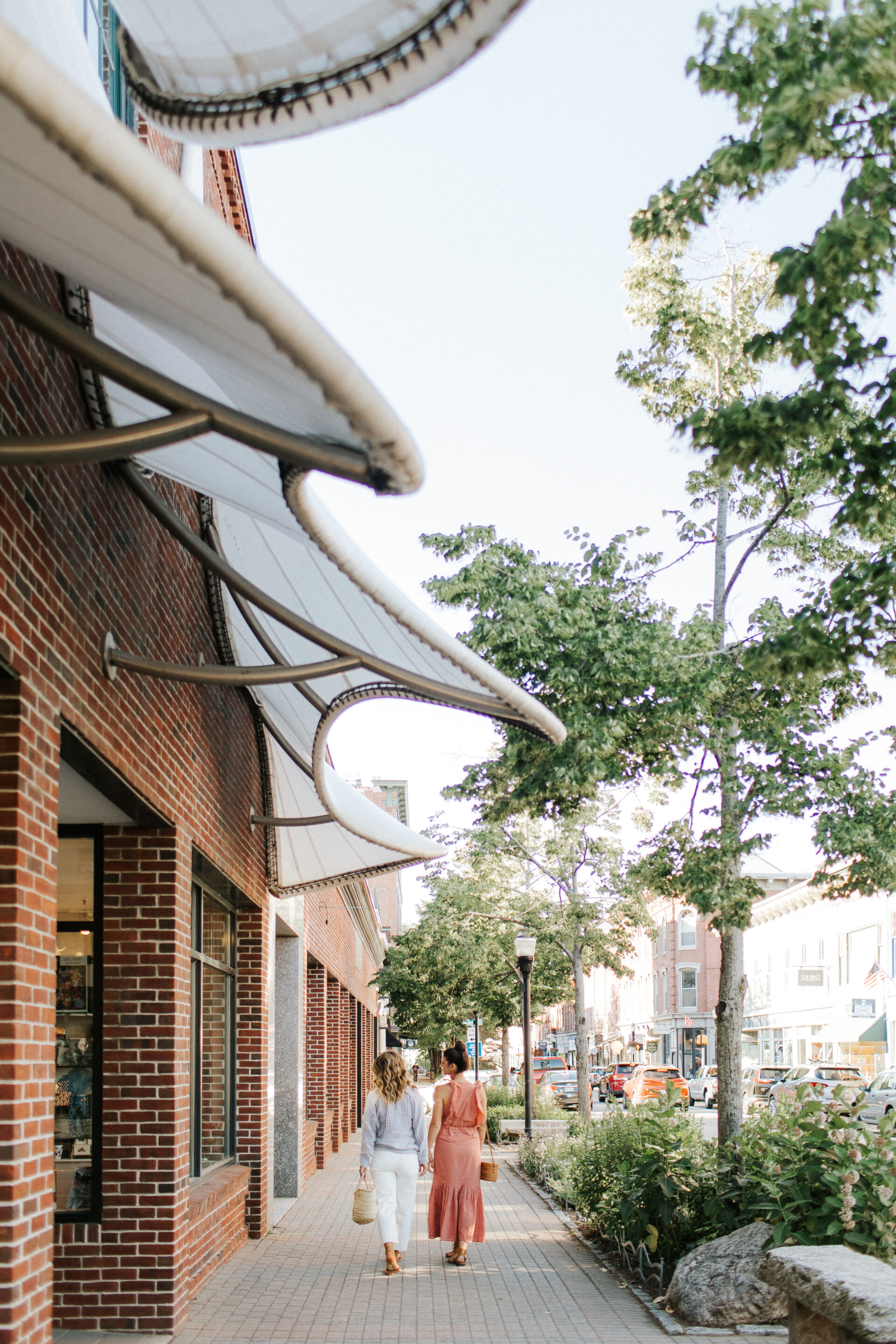 two women walking downtown rockland maine