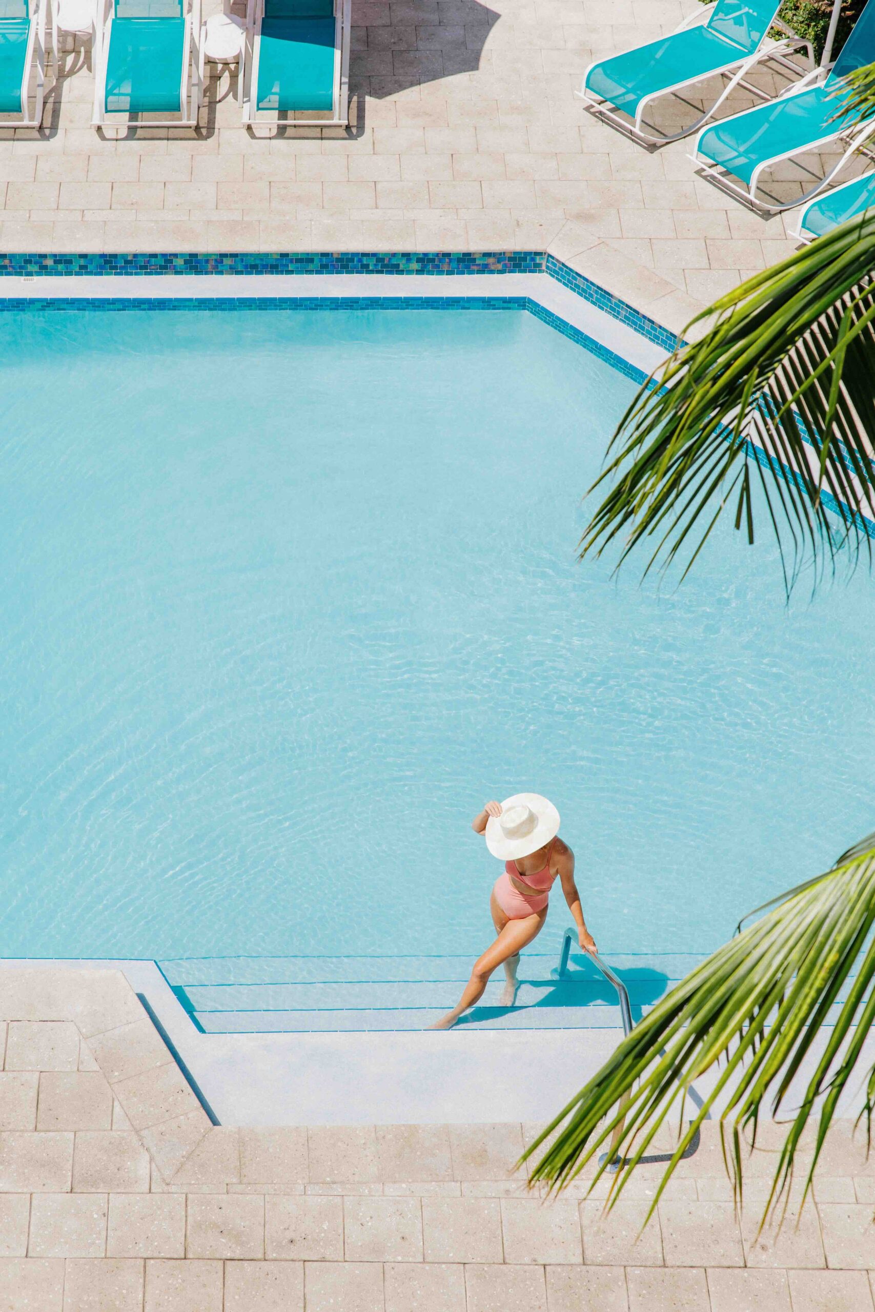 woman standing in the pool