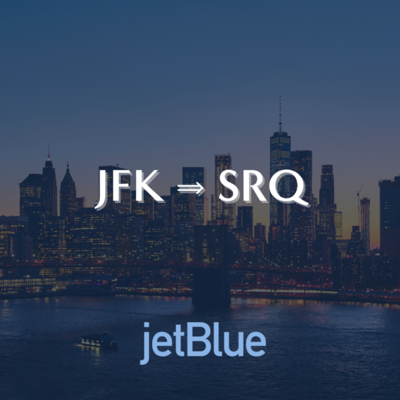 A city skyline at dusk with illuminated buildings. The text reads JFK ⇒ SRQ above and jetBlue below, indicating a flight route.
