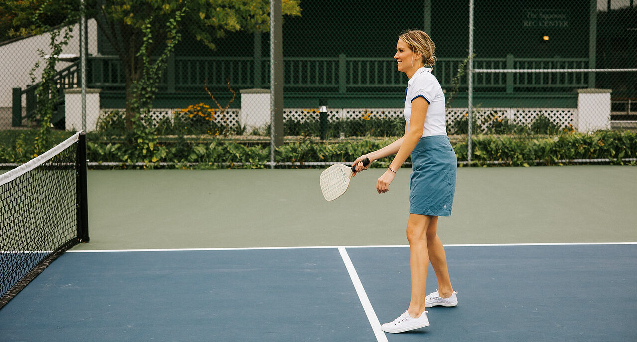 woman playing pickle ball