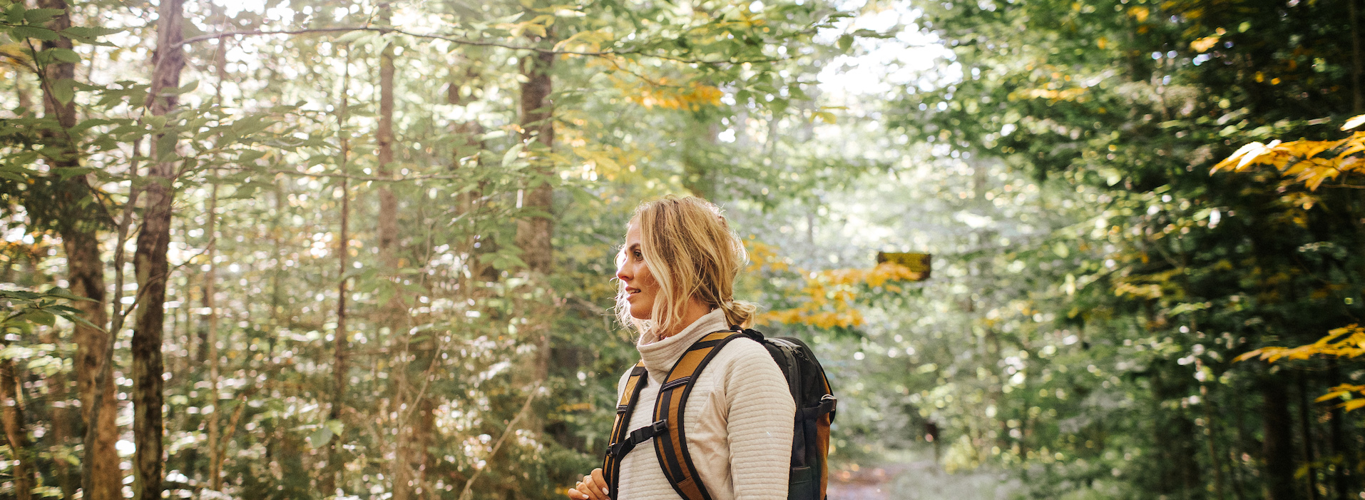 Woman Hiking with Fall Foliage