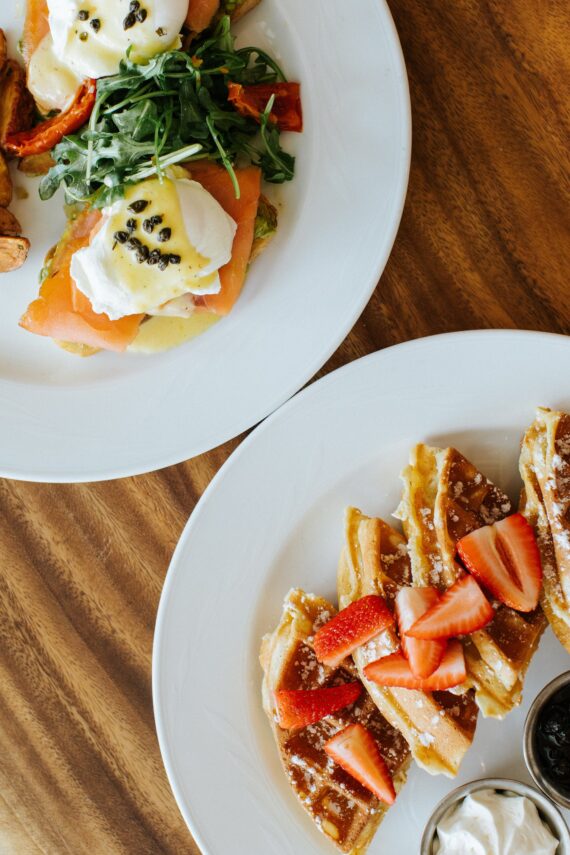 plate of waffles and eggs