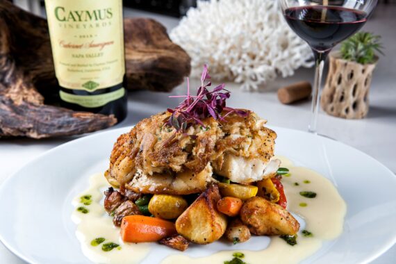 Fresh Seafood on a bed of vegetables and potatoes served at Drift.