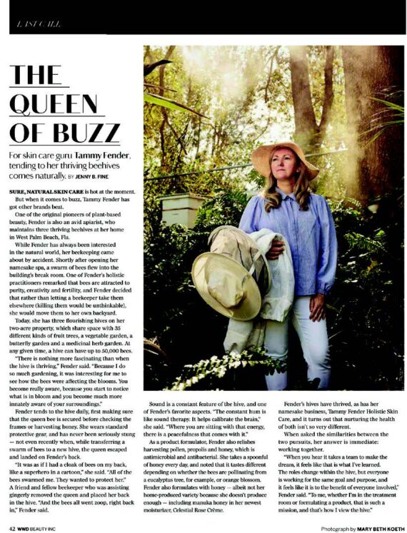 A magazine page titled The Queen of Buzz featuring a woman in a hat standing outdoors, surrounded by greenery. The text discusses skincare and beekeeping. The layout includes a large photo, columns of text, and decorative elements.
