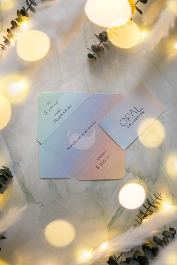 An Opal Collection gift card set to $700, addressed to Andrew from Stephanie.
