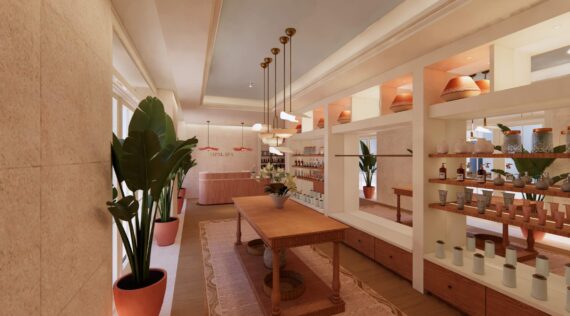 A cozy spa interior with warm lighting, potted plants, wooden shelves displaying products, a large wooden table in the center, and a reception desk in the background. The decor features natural and earthy tones.