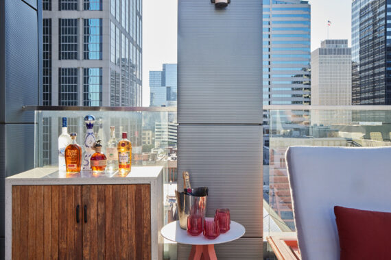 Lounger and mini bar at the rooftop pool, overlooking Downtown Nashville.