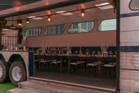 Function space inside a Greyhound Scenicruiser atop Bobby Hotel's rooftop in Nashville.