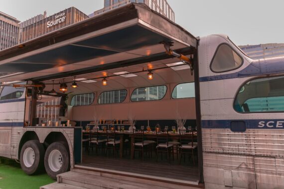 Function space inside a Greyhound Scenicruiser atop Bobby Hotel's rooftop in Nashville.