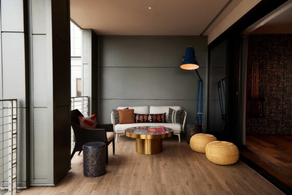 Two bedroom suite deck area at Bobby Nashville showcasing the seating and lighting featured on the deck.