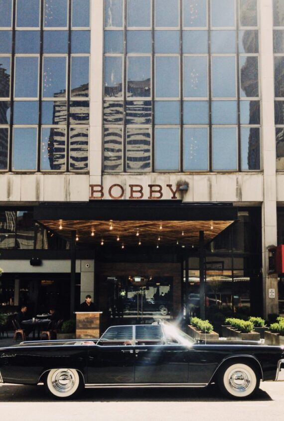 The bright exterior at Bobby Nashville, boasting marquee lights and signage.