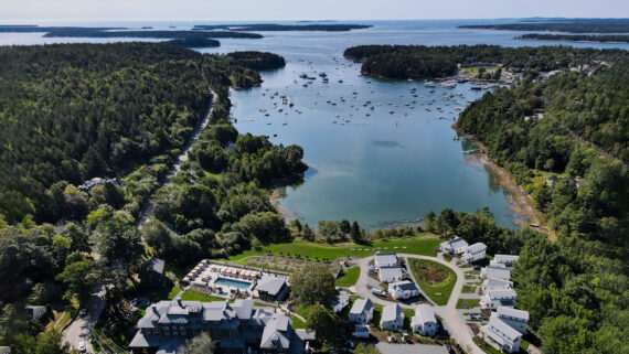An aerial view of The Asticou Hotel overlooking the harbor in Northeast Harbor, Maine