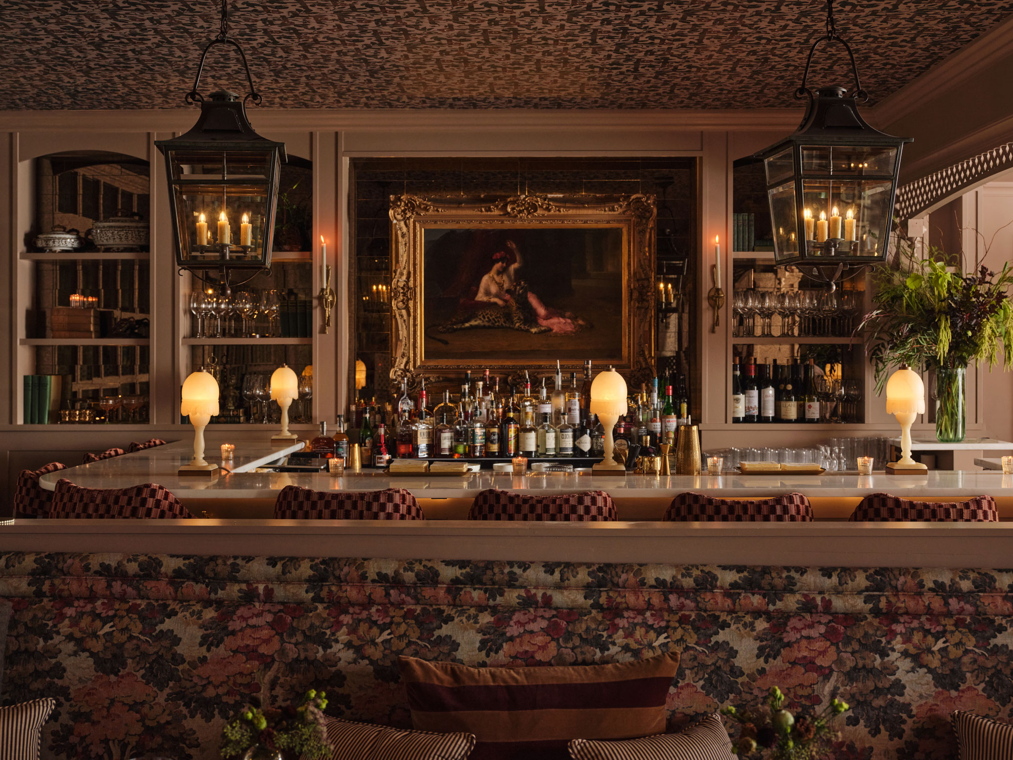 The dark and moody bar at Dahlia's is a signature favorite of the property