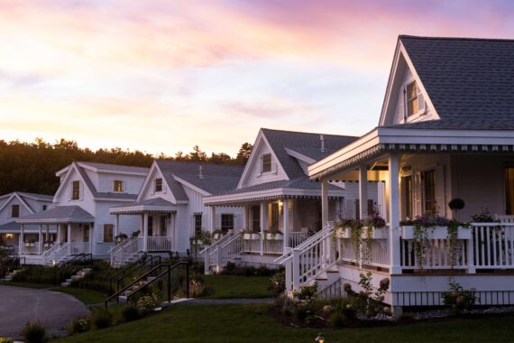 Five Harborside Cottages at dusk at The Asticou in Northeast Harbor