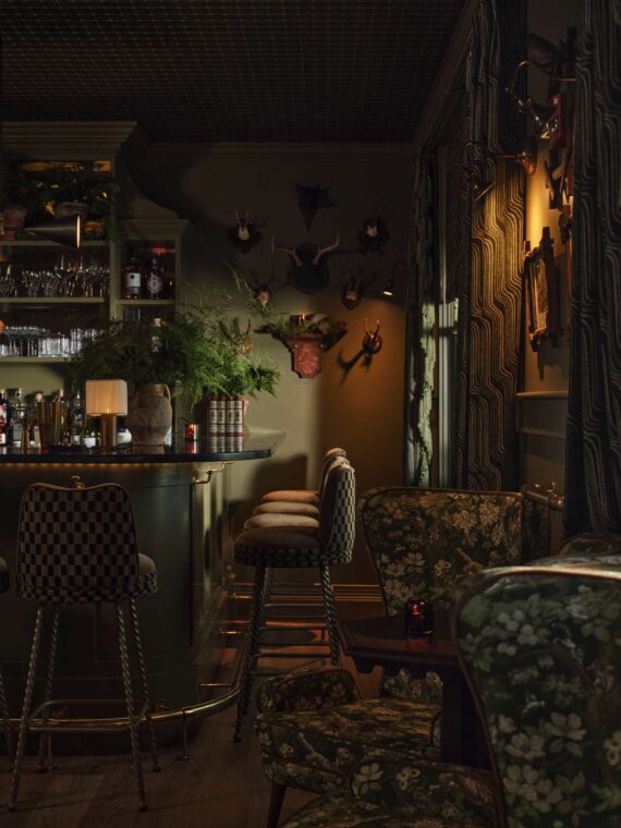 The dark and moody atmosphere of Moss Bar at The Asticou Hotel
