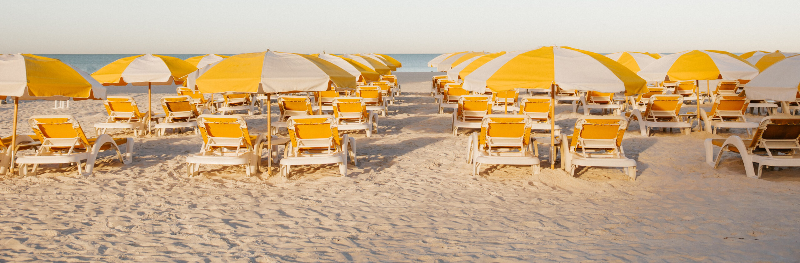 beach view with all the beach lounge chairs and the umbrellas