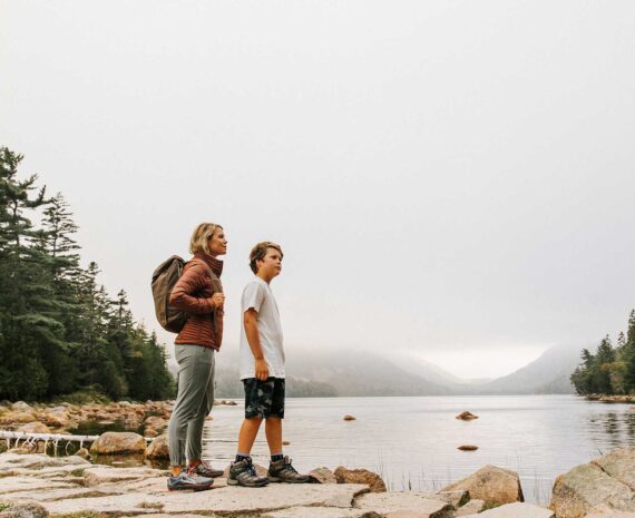 A mom and son explore Jordon Pond in Acadia.