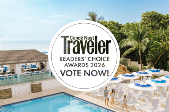 A poolside scene at a beach resort with blue and white lounge chairs and umbrellas. A family walks by the pool. A Condé Nast Traveler Readers Choice Awards 2026 Vote Now! badge is overlaid on the image.